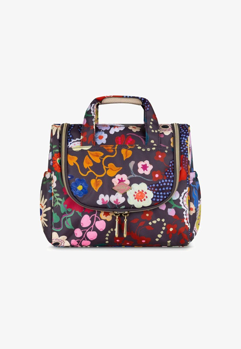Sac en tissu à motif floral avec un fond sombre, deux poignées, fermeture éclair et une poche avant avec quincaillerie dorée.