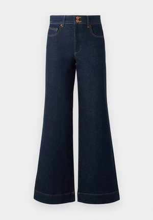 Jean en denim bleu foncé avec une évasement large, taille haute, poches avant et couture dorée contrastante. Équipé d'une fermeture à double bouton.