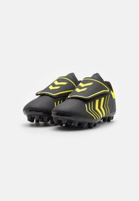 Hummel HATTRICK - Fodboldstøvler til fast underlag - caviar/safety yellow