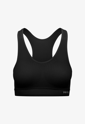 Soutien-gorge de sport noir en tissu lisse, présentant une texture côtelée, un design dos nageur et un logo discret sur le côté inférieur gauche.
