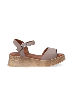 Wedge sandal in light brown leather with a wide toe opening, ankle strap with silver buckle, and textured wooden platform sole.