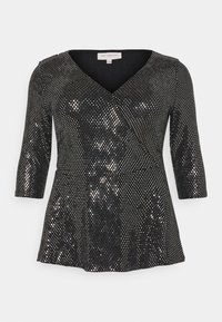 Black top with a V-neck and three-quarter sleeves, featuring a sequined design that adds shine and texture across the fabric.