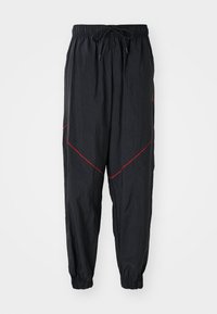 DRAFT PANT - Pantaloni de trening - black/gym red