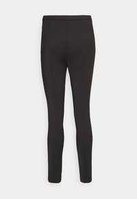 Schwarze, enganliegende Leggings mit glatter Textur, hohem Bund und Nahtdetails an der Vorder- und Rückseite der Beine. Keine Taschen.