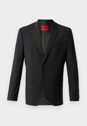 Sort blazer lavet af glat stof, med to frontknapper, spidse klapper og en enkelt brystlomme. Etiket synlig inde i kraven.