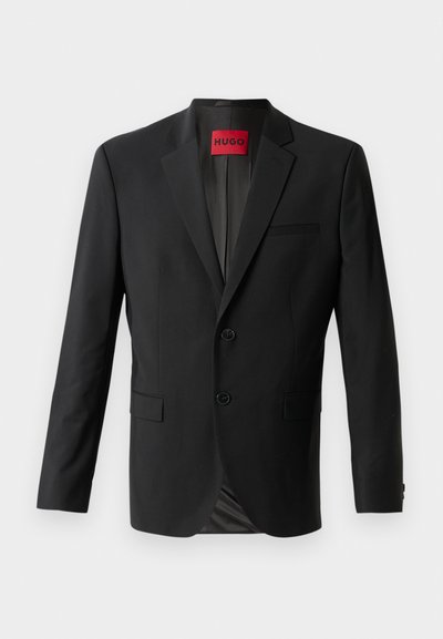 Blazer noir en tissu lisse, avec deux boutons à l'avant, revers crantés et une poche poitrine simple. Étiquette visible à l'intérieur du col.