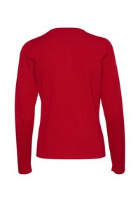 Chemise rouge à manches longues en tissu lisse et légèrement extensible. Présente un col rond et une silhouette ajustée sans embellissements.