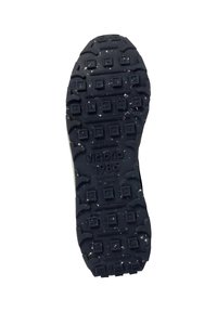 Suola della scarpa con una superficie in gomma nera testurizzata, caratterizzata da motivi quadrati e rettangolari, con il marchio in rilievo "victoria 1985" e segni di usura.