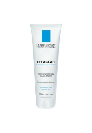Squeeze tube of Effaclar deep-cleansing wash cream, 125 mL. White container with blue logo, smooth surface, minimalistic design.