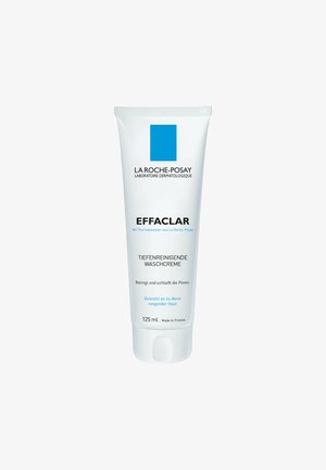 Squeeze tube of Effaclar deep-cleansing wash cream, 125 mL. White container with blue logo, smooth surface, minimalistic design.