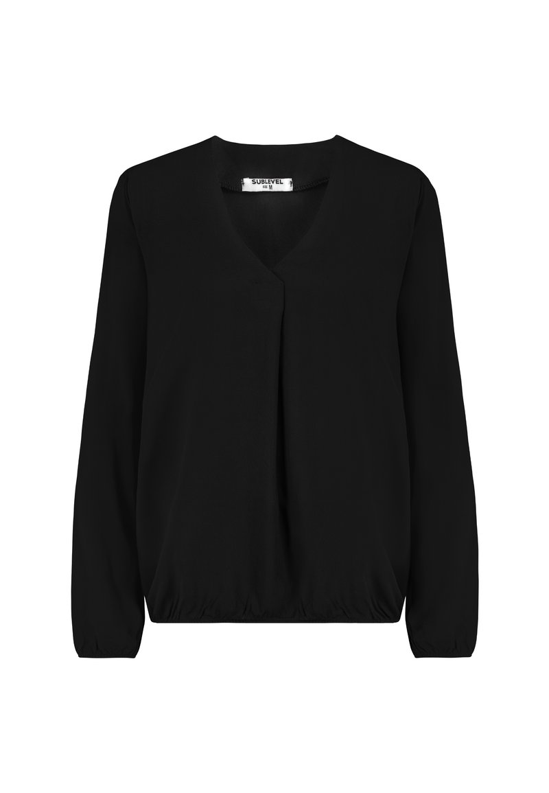 Black long-sleeve blouse with V-neck, relaxed fit, elastic cuffs, and a gathered elastic hem, labeled size M.