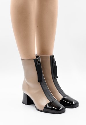 Bottines - beige schwarz