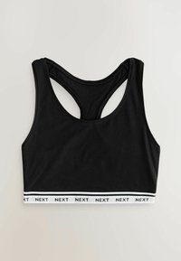 Sutien sport negru cu design racerback, realizat din material neted. Prezintă o bandă elastică albă, cu marcă, în partea de jos, cu inscripții negre.