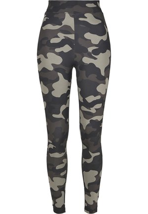 Camo leggings in shades of black, grey, and beige. High-waisted design with a smooth texture and fitted silhouette.