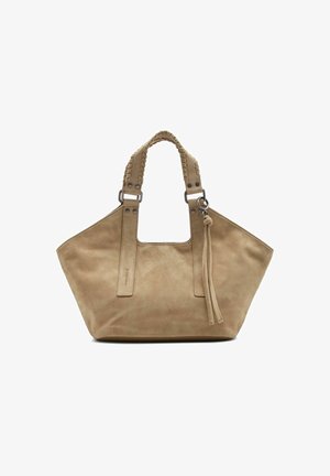 Beigefarbene Wildleder-Handtasche mit breiter trapezförmiger Form, geflochtenen Griffen, Metallringen und zwei hängenden Lederquasten auf einer Seite.