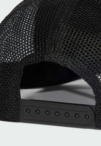 Black mesh cap with a structured design, featuring a solid back and adjustable plastic strap with multiple holes for size adjustment.