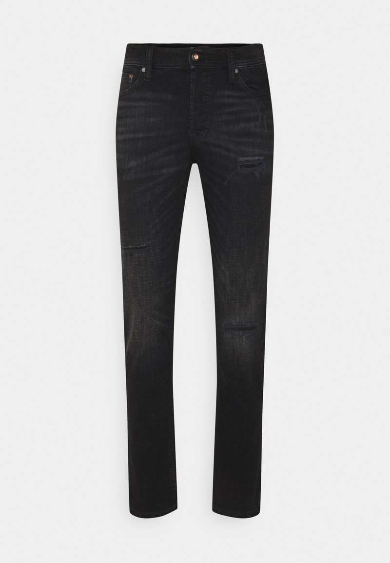 Black denim jeans with a slim fit, featuring distressed areas on the front, five-pocket design, and copper button accent.