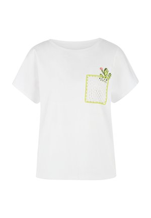 White short-sleeve blouse with a square crochet pocket accented by a small green cactus and pink flower on the chest.