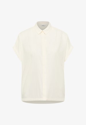 Short-sleeve, collared shirt in light cream fabric. Features a front button closure, straight cut hem, and subtle logo in matching color.