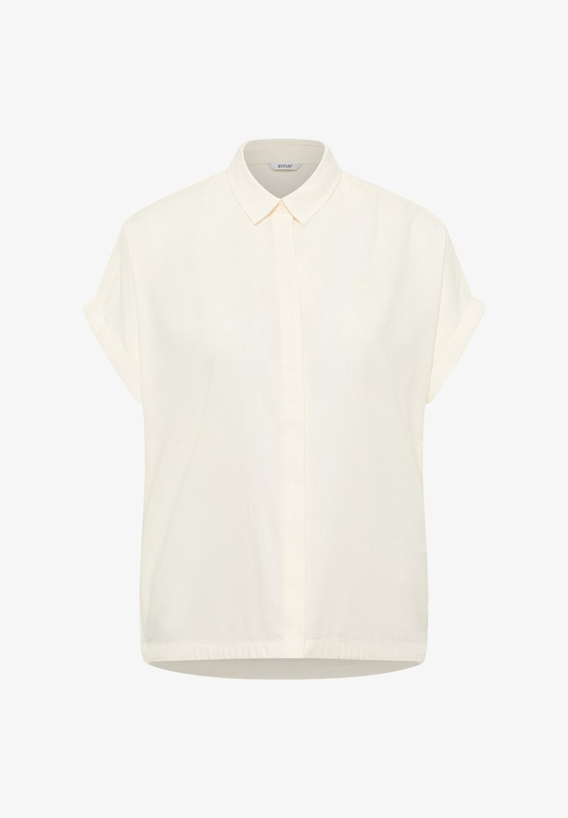 Short-sleeve, collared shirt in light cream fabric. Features a front button closure, straight cut hem, and subtle logo in matching color.