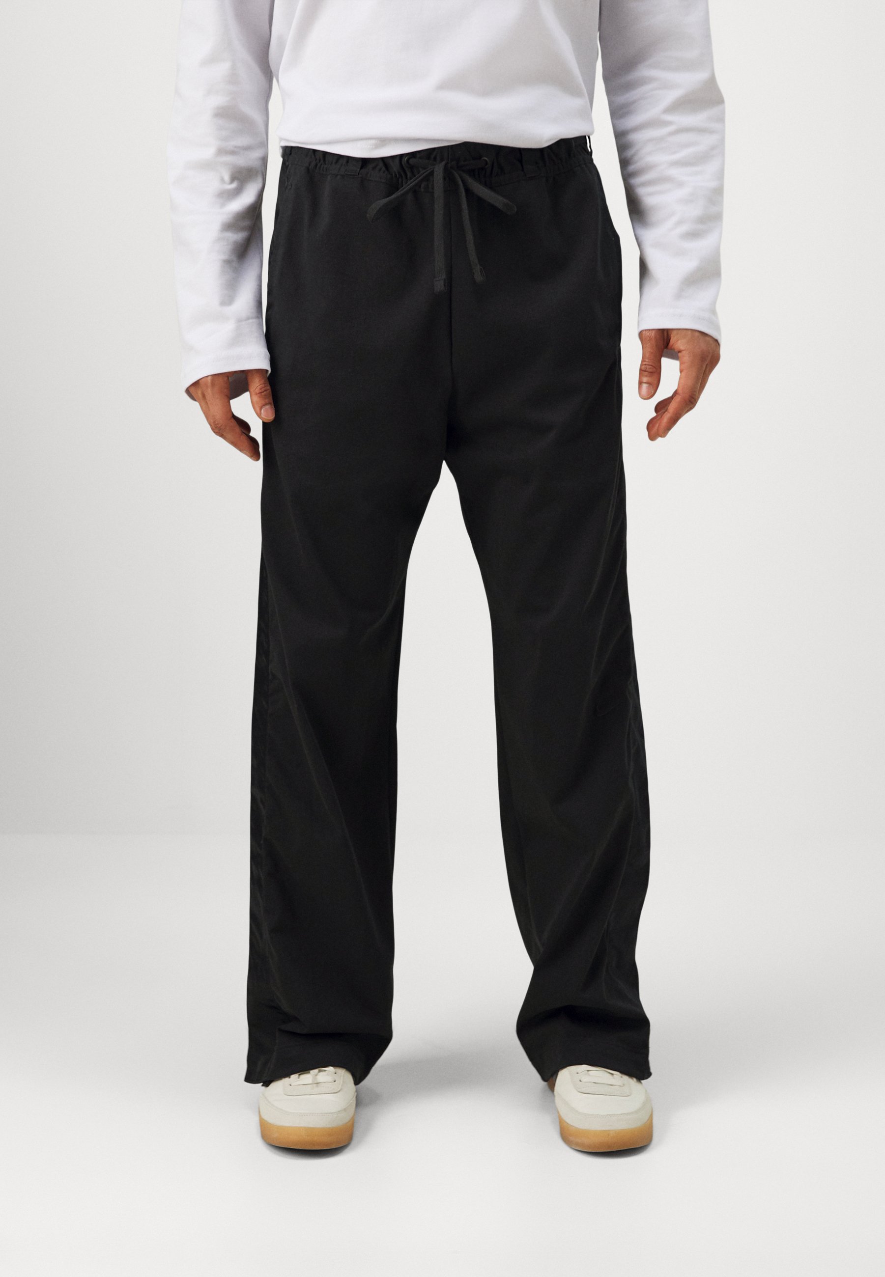Nike Performance DEVIN BOOKER PANT - Tracksuit bottoms - black