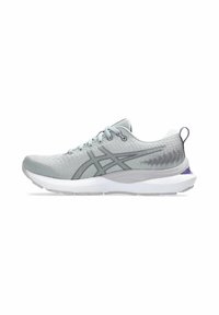 Light gray running shoe with a textured mesh upper, white midsole, and purple accent on the heel. Features lace-up design and padded collar.