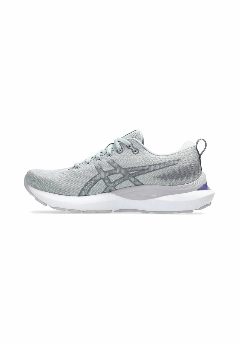 Light gray running shoe with a textured mesh upper, white midsole, and purple accent on the heel. Features lace-up design and padded collar.
