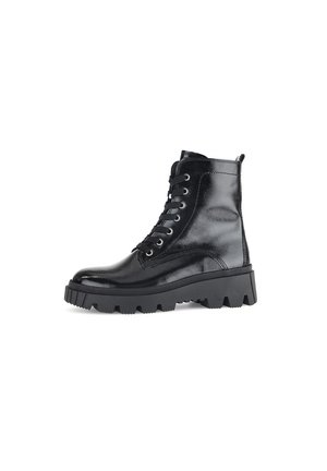 Black leather ankle boots with a glossy finish, featuring a chunky black sole, round toe, and lace-up front with six eyelets.