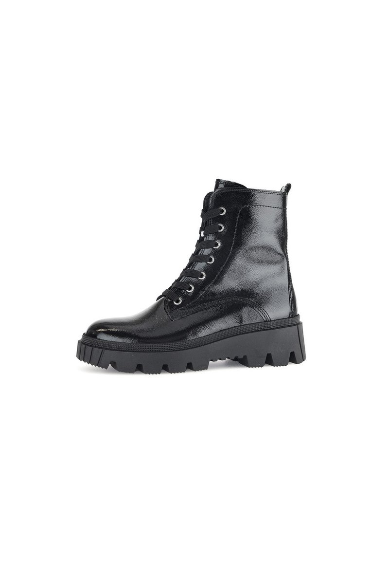Black leather ankle boots with a glossy finish, featuring a chunky black sole, round toe, and lace-up front with six eyelets.