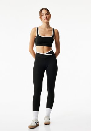 STRAPPY - Alustoppi - black