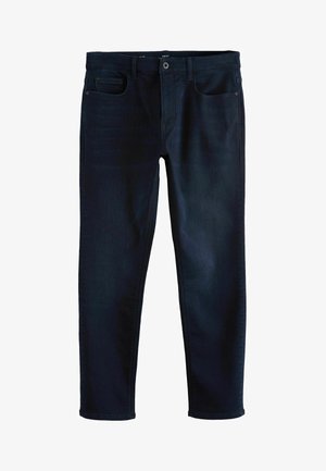 Tamno plave traperice s uskim krojem, koje imaju pet džepova, zatvaranje na dugme i patentni zatvarač te glatku teksturu.