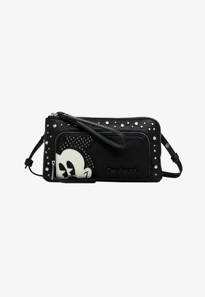 Black leather crossbody bag featuring studded accents, a textured design, and a white cartoon character motif. Zipper closure with wrist strap.