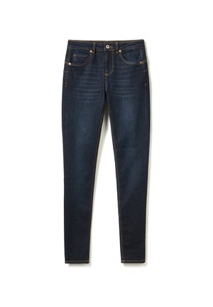 Jean en denim bleu foncé à coupe slim, doté de cinq poches, de coutures dorées et d'une fermeture à bouton unique. Texture lisse et jambes droites.