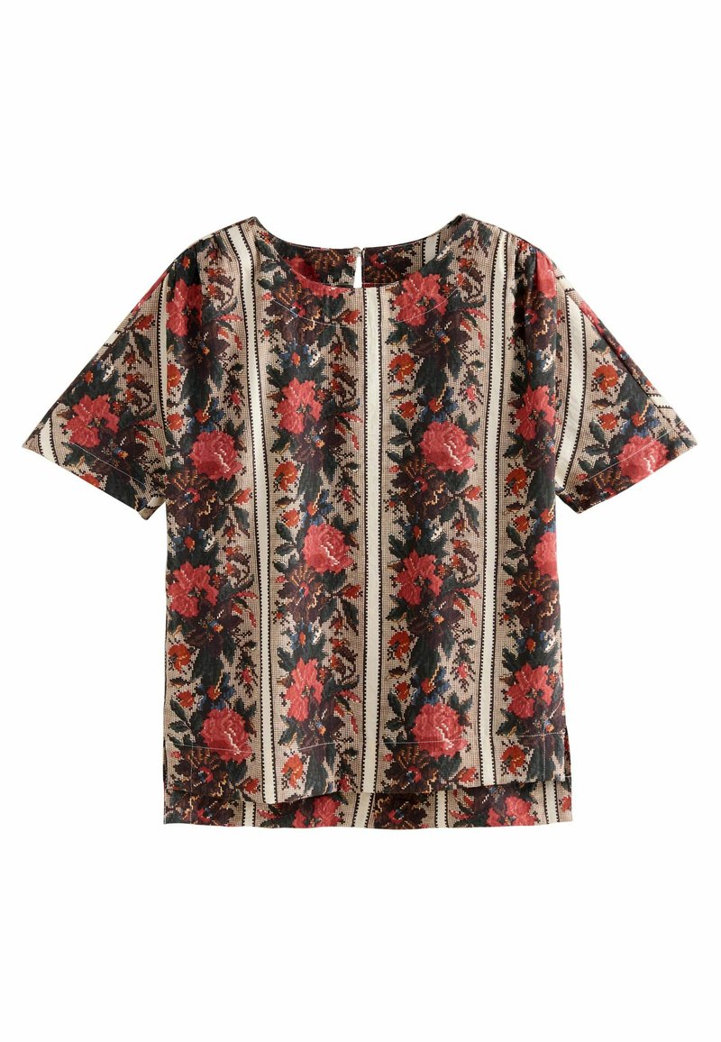 Top de manga corta con estampado floral en colores cálidos, con escote redondeado y corte holgado. Tejido texturizado con rayas contrastantes.