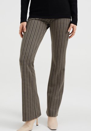 GERUITE FLARED - Leggings - black