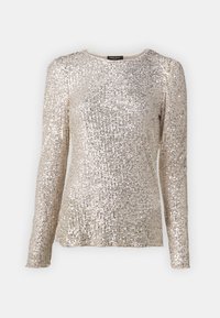 Maglietta a maniche lunghe color champagne, ricoperta di paillettes con una texture a costine. Presenta un collo rotondo e una vestibilità sartoriale.