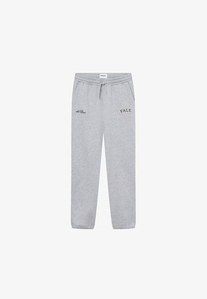 Sivé tepláky vyrobené z mäkkej tkaniny s elastickým pásom, bočnými vreckami a vyšitým logom "Yale" tmavou niťou.
