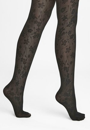 Czarne rajstopy w kwiatowy wzór, półprzezroczysta tekstura i delikatne wykończenie. Posiadają nieprzerwaną gładką górną część.