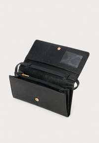 Black wallet made of textured material, featuring a front flap with a snap closure, an ID window, and multiple card and coin compartments.