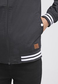 TWINTIP Allvädersjacka - black