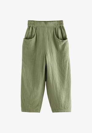 Pantaloni verdi, morbidi al tatto, dal taglio ampio con vita elastica, dotati di tasche laterali e lunghezza cropped.