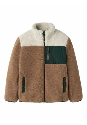 Veste en polaire avec tissu beige et blanc duveteux, poche poitrine matelassée vert foncé avec fermeture éclair, et deux poches avant.