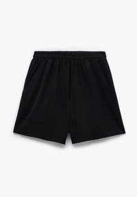 Zwarte shorts van zachte stof, met een elastische tailleband, een trekkoord en twee zakken aan de voorkant. Eenvoudig, relaxed-fit ontwerp.