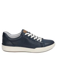 Navy leather sneaker with white laces, padded collar, and a textured white rubber sole. Features a tan logo accent on the side.
