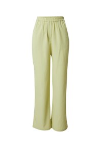 Pantalons larges vert clair avec une taille élastique. Tissu doux avec une texture lisse, dotés de deux poches latérales et sans motifs visibles.