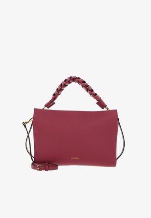 Burgundy leather handbag with braided top handle, detachable shoulder strap, and small gold logo "Coccinelle" on front center.
