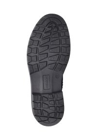 Zwarte rubberen schoenzool met een gestructureerd profielpatroon, inclusief rechthoekige en hexagonale vormen. Het merk "NELSON" is zichtbaar.