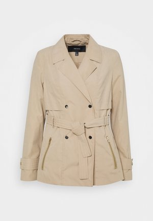 Beige zweireihige Jacke mit Bindegürtel, mit Reißverschlusstaschen an den Seiten und strukturierten Schulternähten. Glatter, leichter Stoff.