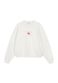 Felpa bianca in tessuto morbido, con fiocco ricamato rosa al centro, spalle scese e polsini a costine.