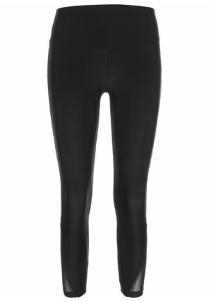 Schwarze, gerippte Leggings mit hoher Taille, ausgestattet mit Netzeinsätzen an den Knöcheln. Glatte Textur mit enganliegendem Design.